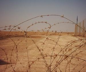 http://www.spacedaily.com/images-lg/iran-iraq-border-barbed-wire-lg.jpg