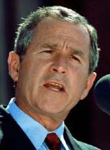 George Bush, presidente americano e invasor profissional.